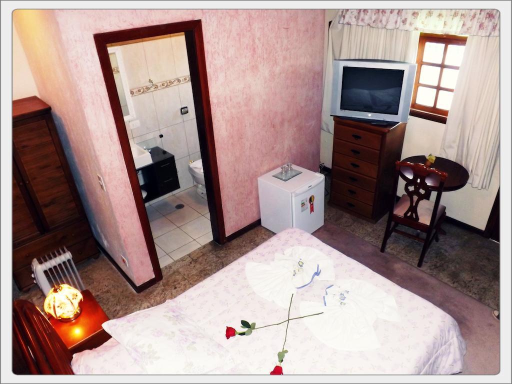 Pousada Das Rosas Campos do Jordão Quarto foto
